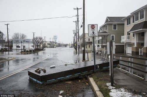 308220F100000578-3413454-A_floating_dock_sits_on_the_sidewalk_following_flooding_during_a-m-64_1453608395018